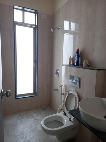 Bathroom in 3 BHK Apartment at Vasant Fiona, Pokhran Road No 2 – for Rent