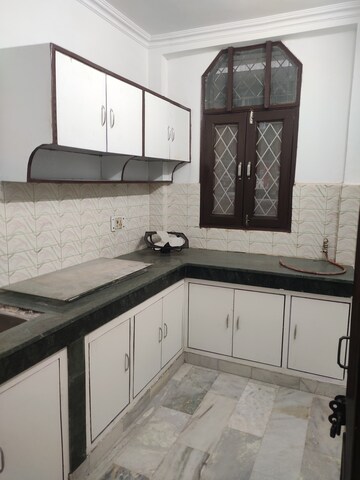 Kitchen in 2 BHK Builder Floor at Khirki Extension – for Rent