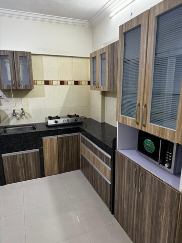 Kitchen in 1 BHK Apartment at Duville Riverdale Suites, Kharadi – for Rent