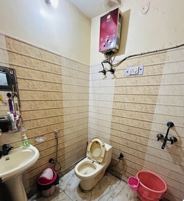 Bathroom in 3 BHK Builder Floor at Niti Khand – for Sale