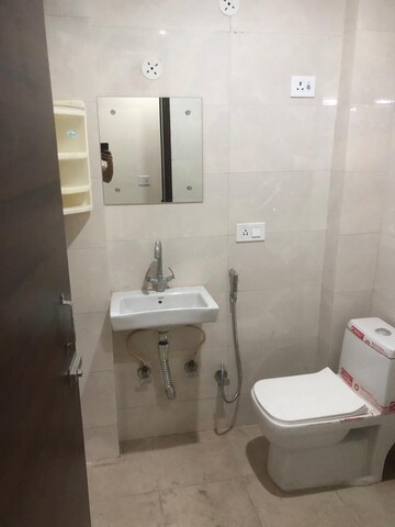 Bathroom in 1 RK Apartment at Mahipalpur – for Rent