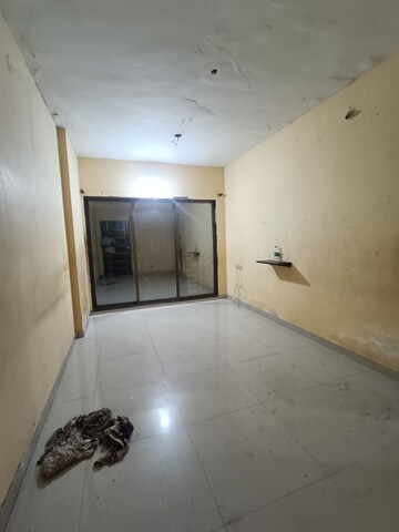 Living Room in 1 BHK Apartment at Ostwal Height, Mira Road – for Sale