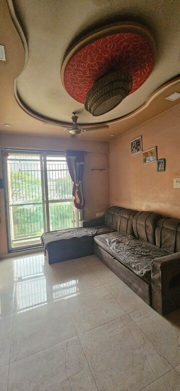 Living Room in 1 BHK Apartment at JH Zojwala Regency Park, Kalyan East – for Rent