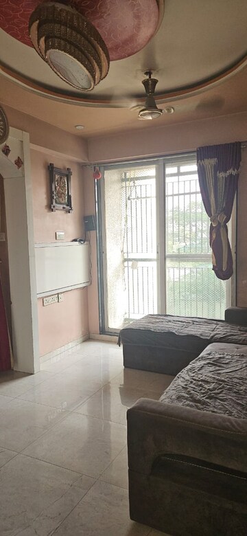 Living Room in 1 BHK Apartment at JH Zojwala Regency Park, Kalyan East – for Rent