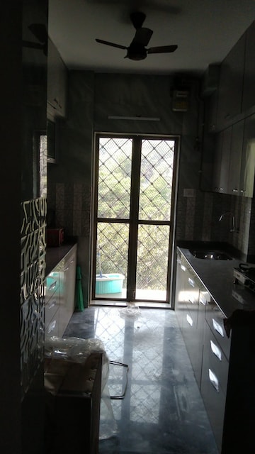Kitchen in 3 BHK Apartment at Raunak Park, Kokanipada – for Rent