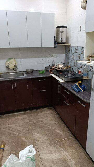 Kitchen in 3 BHK Apartment at Rohini Sector 4 – for Sale
