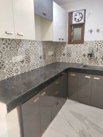 Kitchen in 2 BHK Builder Floor at Khirki Extension – for Rent