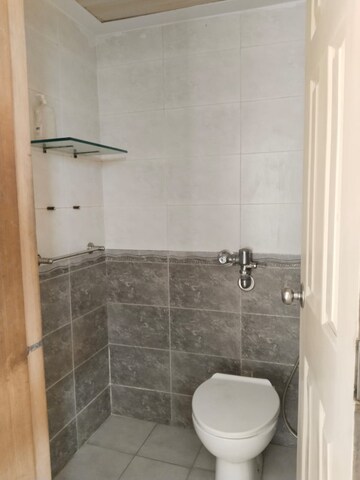 Bathroom in 3 BHK Apartment at Dweepmala Gauri Priya, Kharghar – for Rent