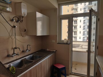 Kitchen in 3.5 BHK Apartment at Puri Emerald Bay, Sector 104 – for Sale
