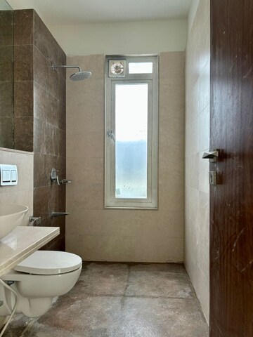 Bathroom in 4 BHK Apartment at Omkar Alta Monte, Malad East – for Rent