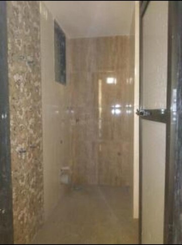 Bathroom in 1 BHK Apartment at Ritu Gardenia, Naigaon East – for Rent