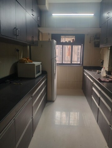 Kitchen in 2 BHK Apartment at Shiv Bhagtani Manor 3B CHS, Chandivali – for Rent