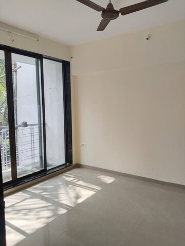 Bedroom in 2 BHK Apartment at Kesar Harmony, Kharghar – for Rent