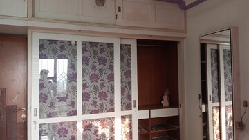Bedroom in 2.5 BHK Apartment at Lokhandwala Infrastructure Sapphire Heights, Kandivali East – for Sale