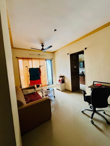 Living Room in 1 BHK Apartment at Christine Heights, Mira Road – for Sale