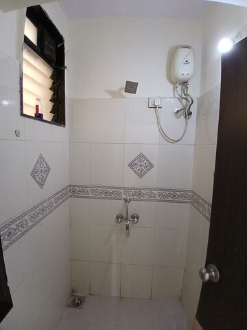 Bathroom in 1.5 BHK Apartment at Mantri Park, Goregaon East – for Rent