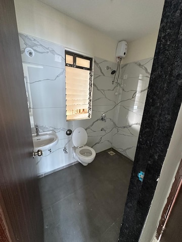 Bathroom in 1 BHK Apartment at Raunak City, Kalyan West – for Rent