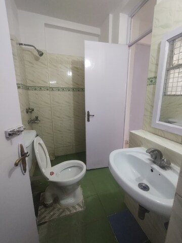 Bathroom in 2 BHK Apartment at Ansal Sushant Lok I, Sector 43 – for Rent