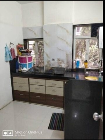 Kitchen in 1 BHK Apartment at Shubh Tirupati Apartment, Andheri West – for Rent