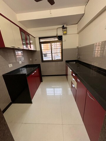 Kitchen in 2 BHK Apartment at Acme Ozone, Manpada – for Sale