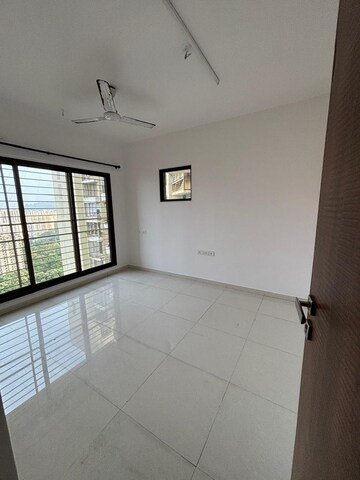 Room in 2 BHK Apartment at Acme Ozone, Manpada – for Sale