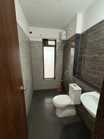 Bathroom in 2 BHK Apartment at Acme Ozone, Manpada – for Sale