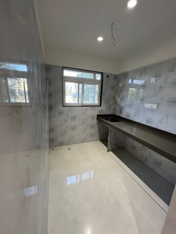 Kitchen in 1 BHK Apartment at Vaibhavlaxmi Queens Avenue, Chembur – for Sale