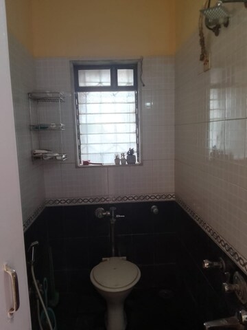 Bathroom in 1.5 BHK Apartment at National Avenue, Kandivali East – for Rent