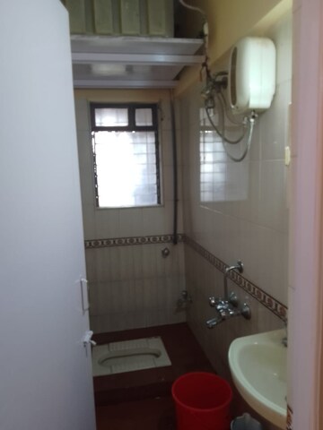 Bathroom in 1.5 BHK Apartment at National Avenue, Kandivali East – for Rent