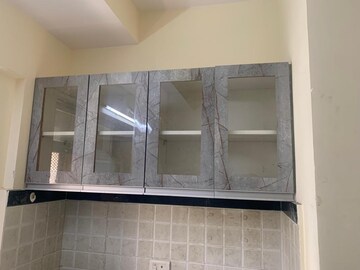 Kitchen in 1 BHK Apartment at Mahavir Kalpavruksha, Ghodbunder Road – for Sale