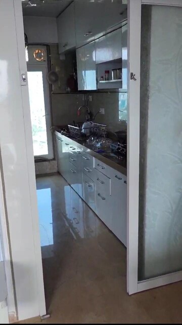 Kitchen in 2 BHK Apartment at Happy Home Complex, Mira Road – for Sale