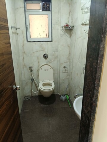 Bathroom in 2 BHK Apartment at Kamala Nav Natraj, Santacruz West – for Rent