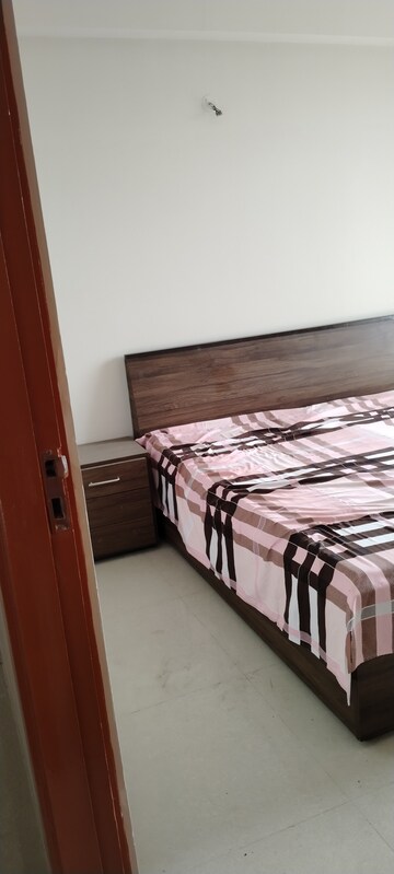 Bedroom in 2 BHK Apartment at Tata Eureka Park, Sector 150 – for Rent