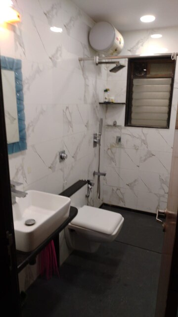 Bathroom in 2 BHK Apartment at Indradarshan II, Oshiwara – for Rent