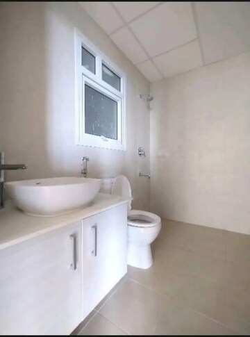 Bathroom in 2 BHK Apartment at Bhartiya Nikoo Homes, Thanisandra Main Road – for Sale
