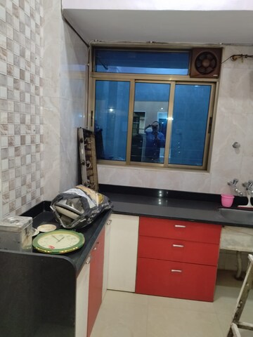 Kitchen in 1 BHK Apartment at PNK Winstone, Mira Road – for Sale