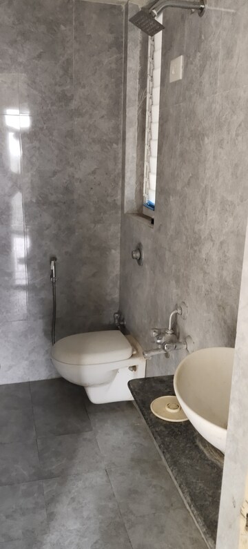 Bathroom in 1 BHK Apartment at Bharat Ecovistas, Shilphata – for Rent