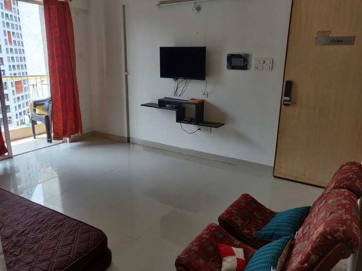 Living Room, amanora-desire-tower 1 Bedroom 560 Sq.Ft. Apartment In Magarpatta Road Pune 7890110