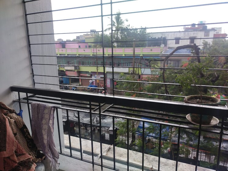 Balcony, symphony-towers 3 Bedroom 1200 Sq.Ft. Apartment In Behala Kolkata 7890302