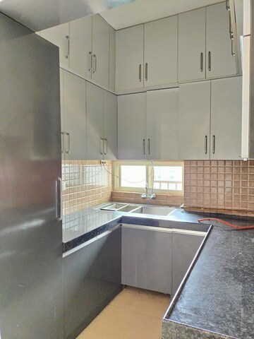 Kitchen in 2 BHK Apartment at Saya Gold Avenue, Vaibhav Khand – for Rent