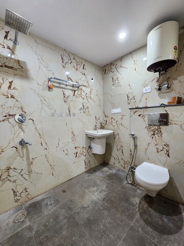 Bathroom in 3 BHK Apartment at Chattarpur – for Rent