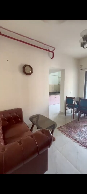 Living Room in 1 BHK Apartment at Sunteck West World, Naigaon East – for Rent