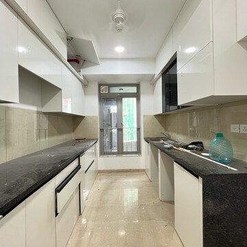 Kitchen in 3 BHK Apartment at Oberoi Sky City, Khande Rao Dongari – for Rent