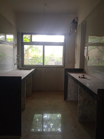 Kitchen in 2 BHK Apartment at Saaga Nav Sarvodaya Chs Ltd, Vile Parle East – for Sale