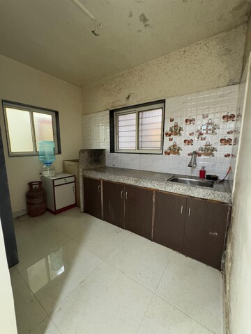 Kitchen in 1 BHK Apartment at Shahenshah CHS, Koregaon Park – for Rent