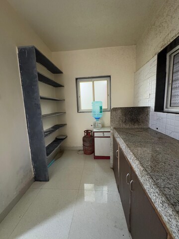 Kitchen in 1 BHK Apartment at Shahenshah CHS, Koregaon Park – for Rent