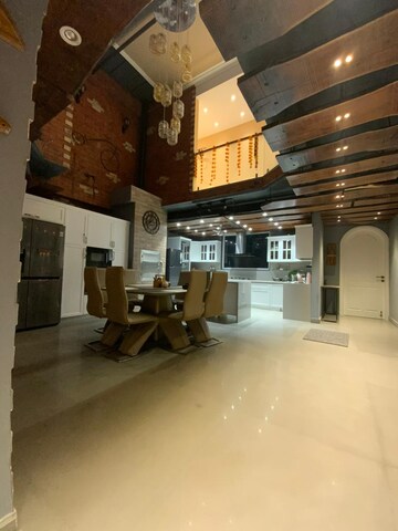 Living Room in 5 BHK Villa at Dlf Phase iv – for Sale