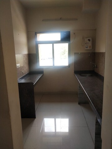 Kitchen in 2 BHK Apartment at Heena Garden, Kalyan West – for Rent