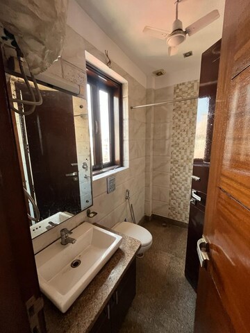 Bathroom in 3 BHK Builder Floor at Kalkaji – for Rent