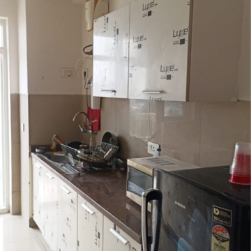 Kitchen in 3 BHK Apartment at Emaar Palm Gardens, Sector 83 – for Rent